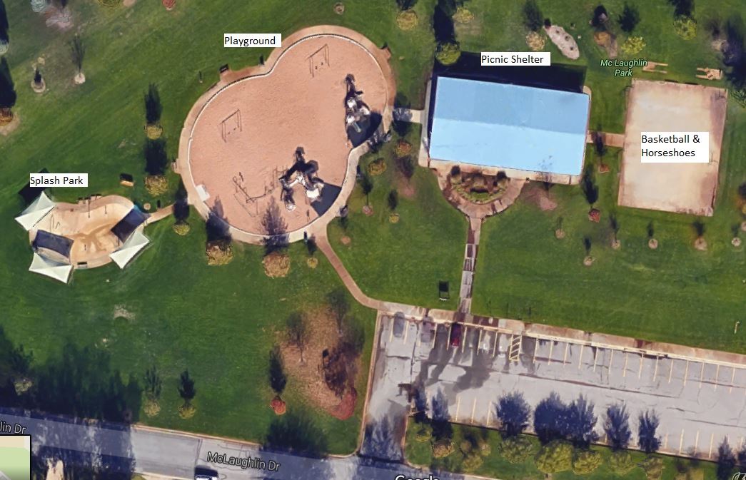 Aerial view of a park featuring a playground